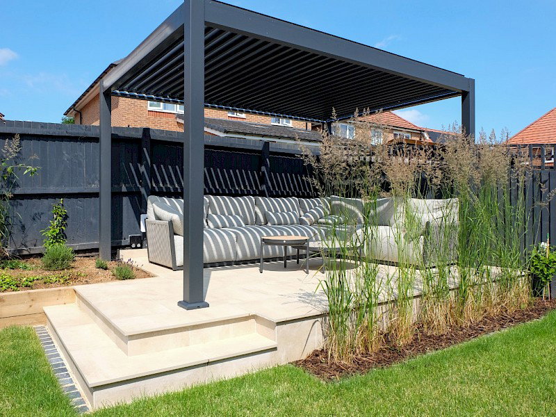 Modern garden design with sheltered seating area